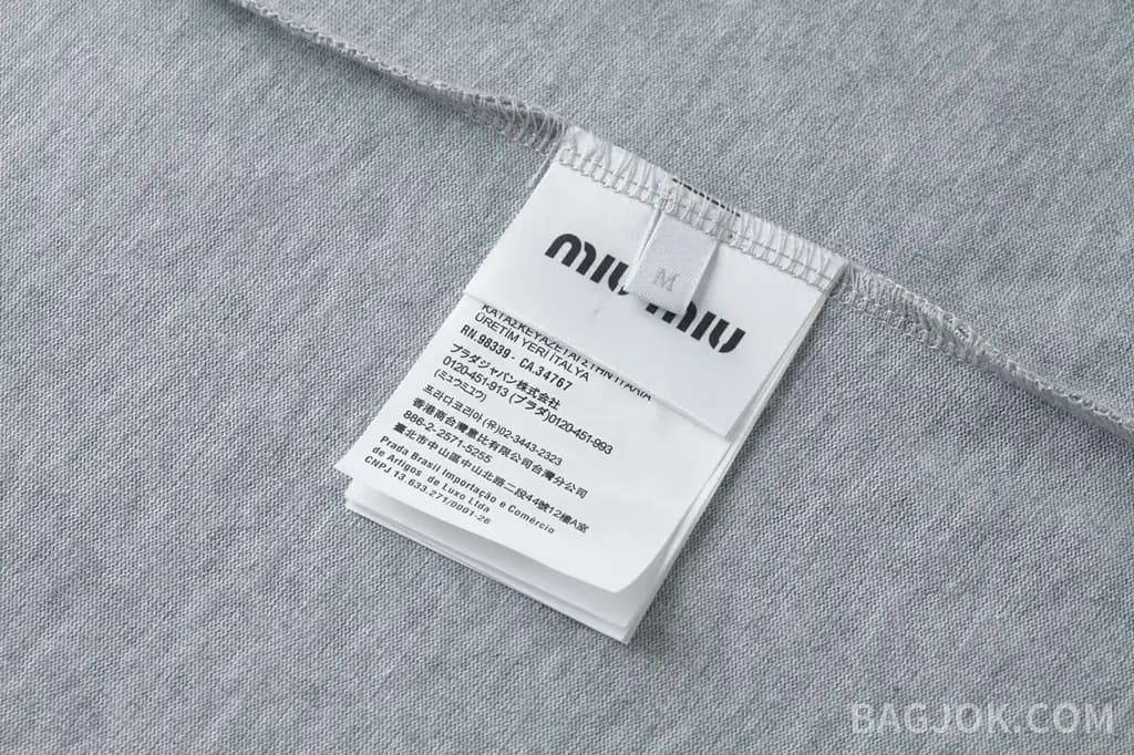 미우미우 미우미우 레이저 패치 자수 폴로 셔츠 상세 이미지