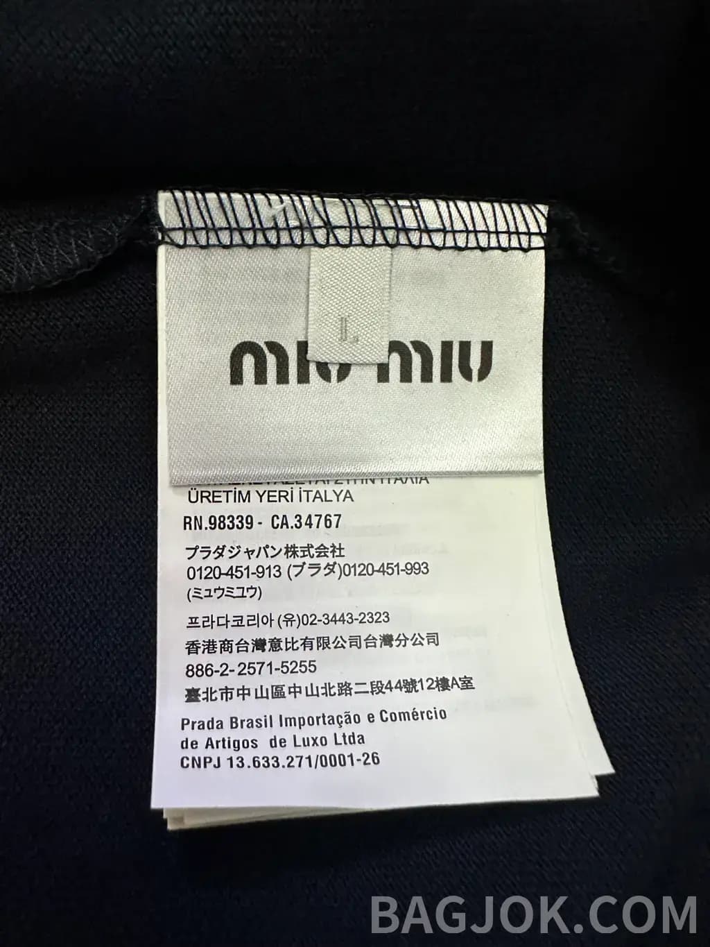 미우미우 미우미우 체크 칼라 포인트 피케 폴로 티셔츠 상세 이미지