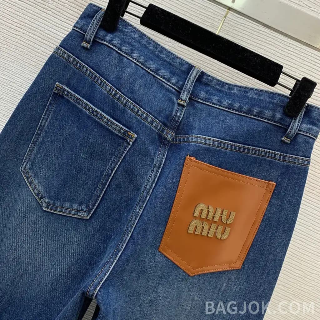 미우미우 미우미우 가죽 패치 와이드 데님 팬츠 상세 이미지