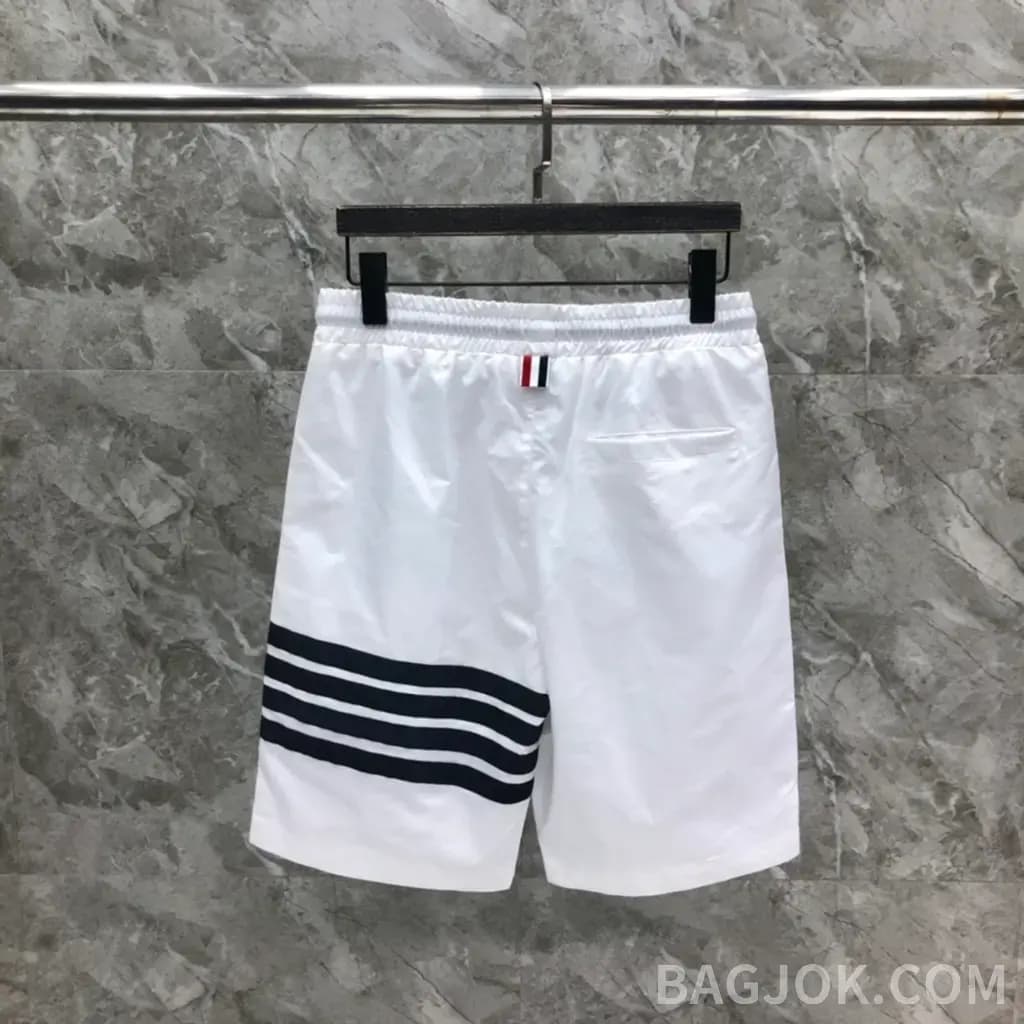 톰브라운 톰브라운 시그니처 삼색 스트라이프 나일론 스윔 쇼츠 상세 이미지